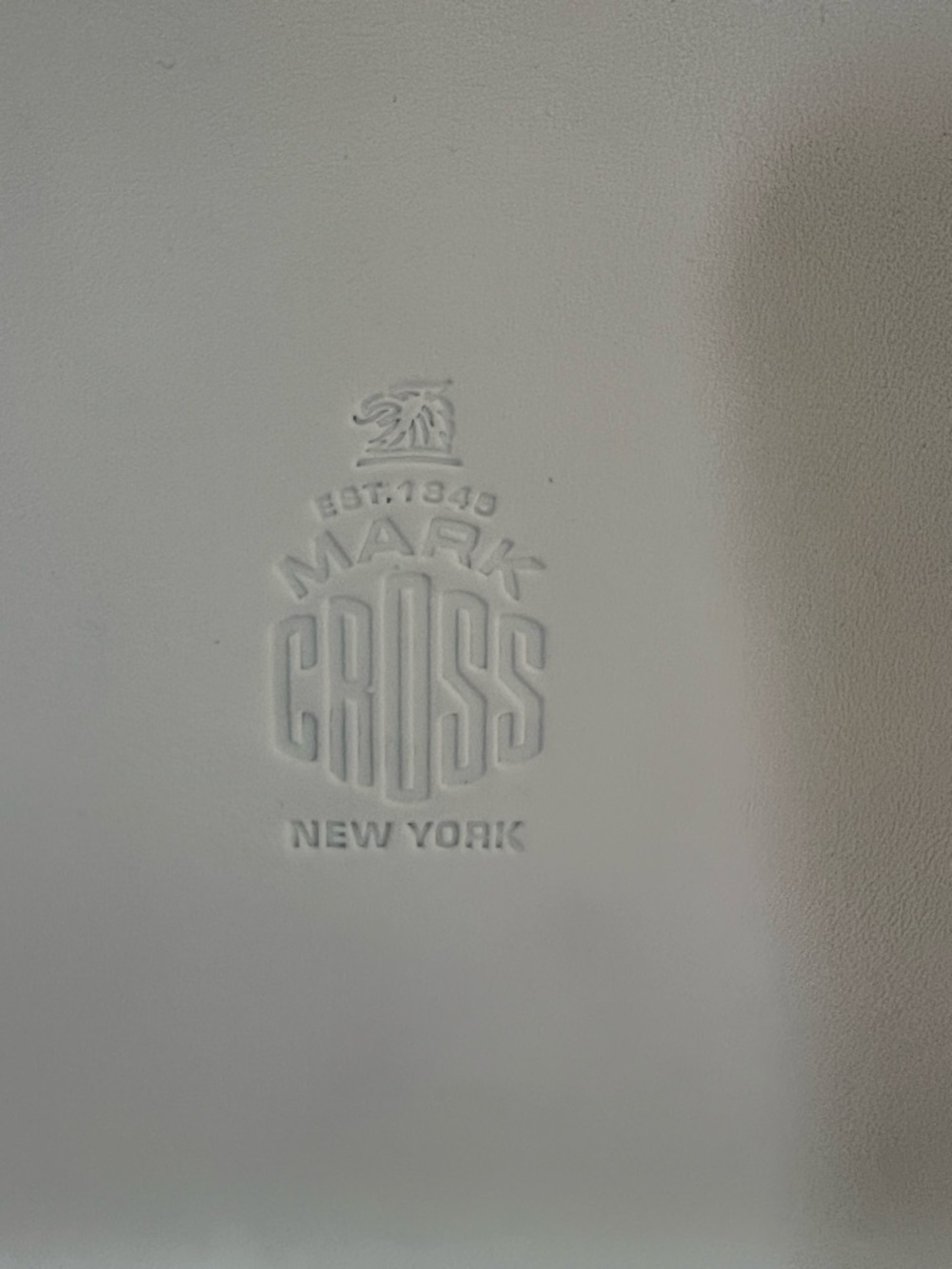 Mark Cross New York Embossed Logo Leather